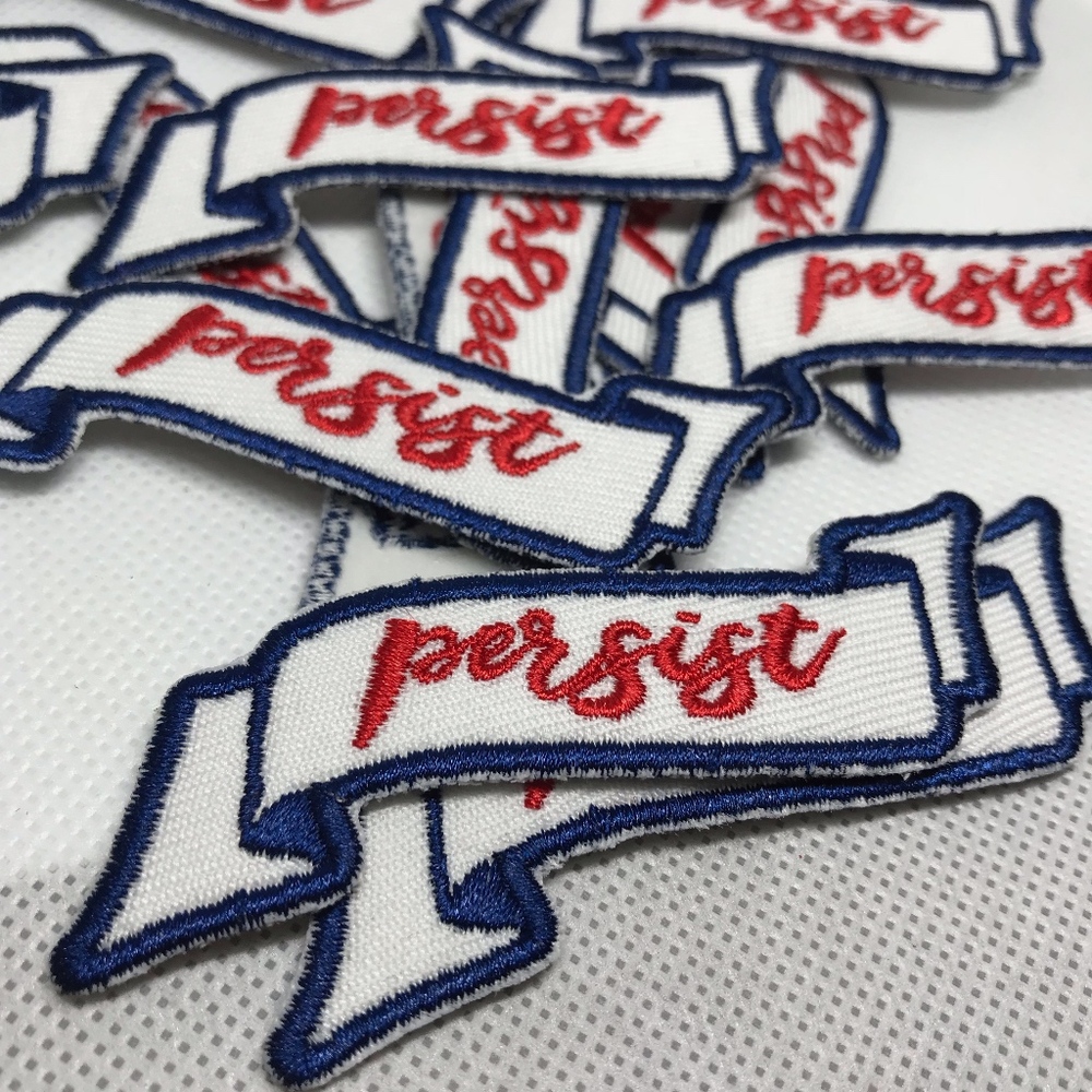 Red, White, and Blue Persist Iron On Patch!